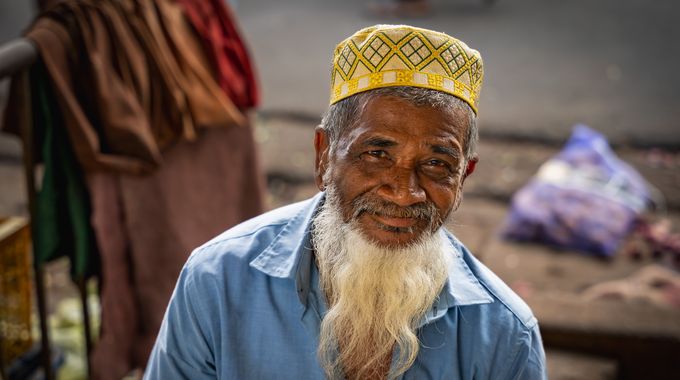 An elderly man in a Sri Lankan market